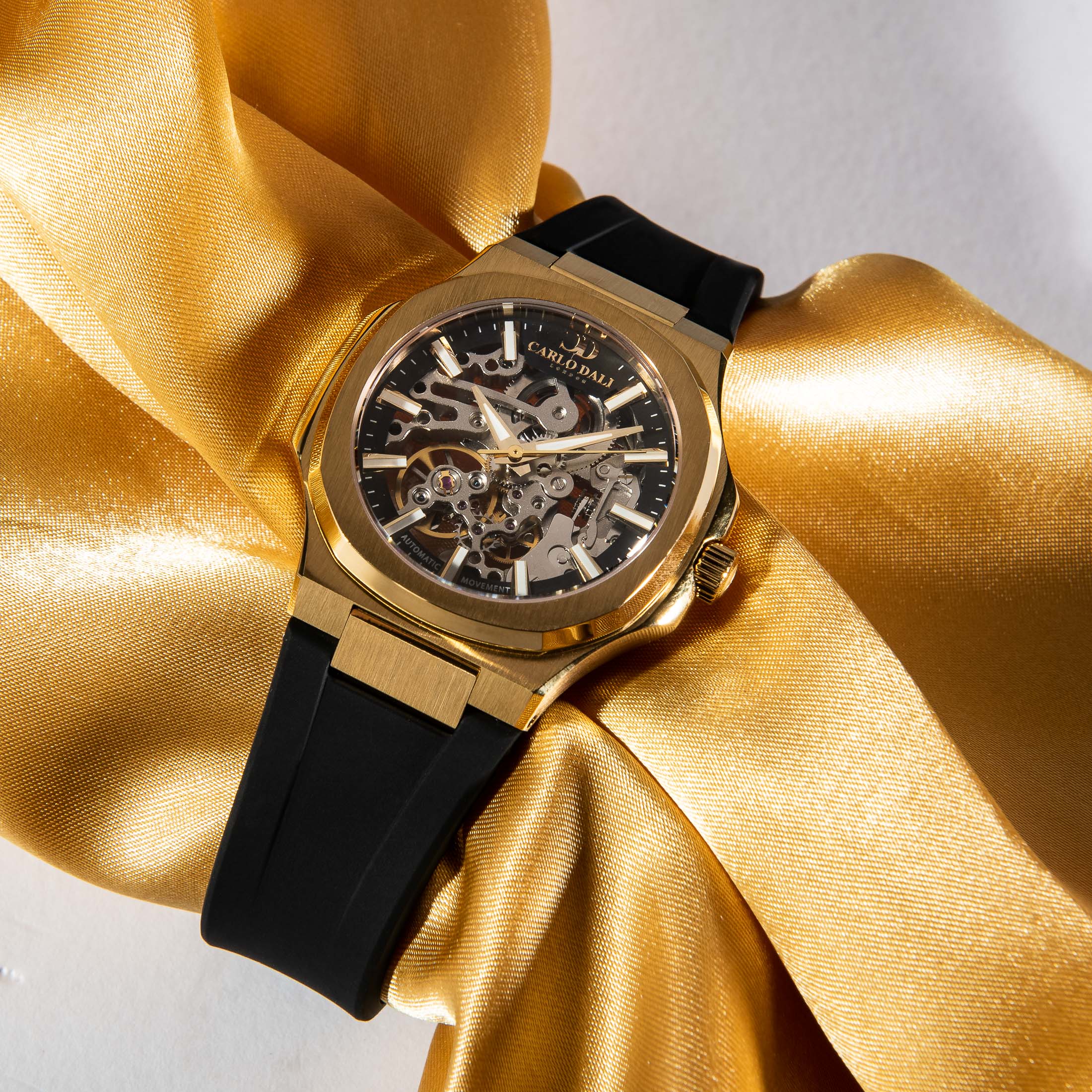 "TIMELESS" SKELETON BLACK & GOLD RUBBER WATCH